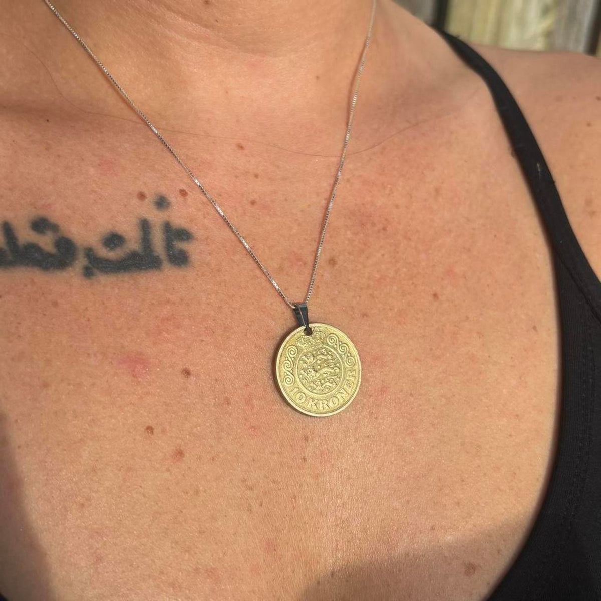 10 kroner gold coat of